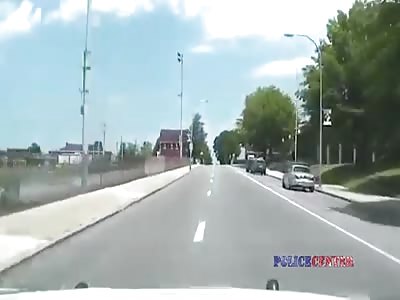 Dashcam Shows Police Car Flip Following Collision