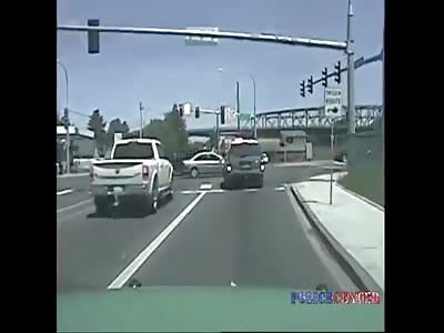 Dashcam Shows Police SUV Crash at Intersection
