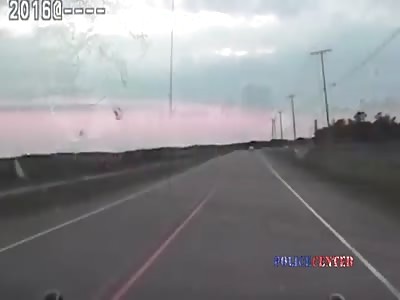Dashcam - Woman Drags Officer with Car Prompting Chase