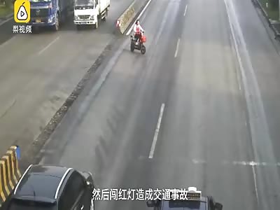 Woman on a scooter makes a left turn and gets hit by a truck 