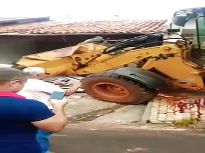 crushed by construction machine