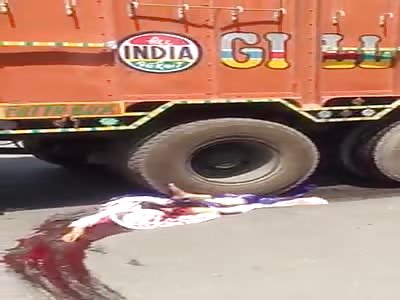 (Other Angle) Woman crushed by Truck