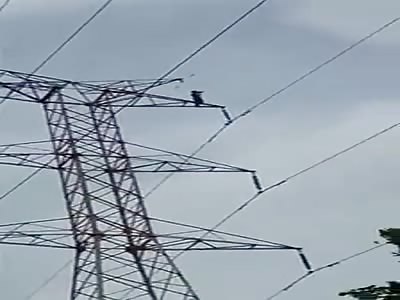 Suicide man in electric tower.