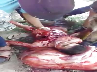 EXTREMELY GRAPHIC :Brutal Video Shows Narco rival being chopped and ripped out his heart 