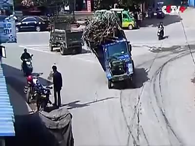 truck turns and buries passerby