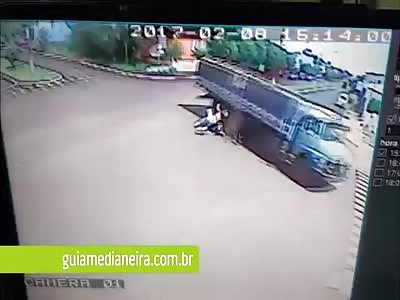 Shocking motorcyclist crashes in truck