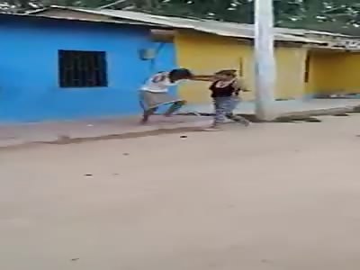 Young woman hits old woman with a machete