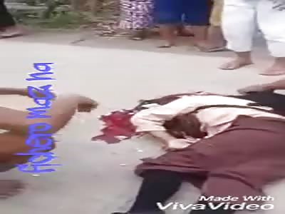 Woman with head crushed by truck