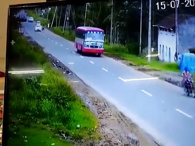 Biker crushed by bus