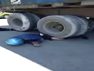 Man Crushed under Truck still Conscious and Alive