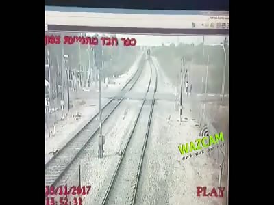 WOMAN SUICIDES ON TRAIN TRACKS