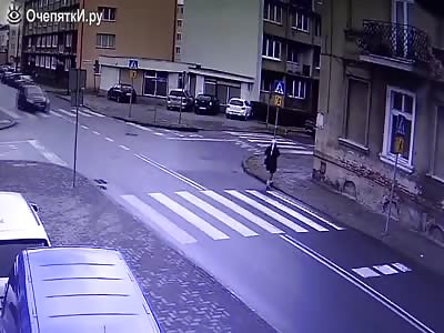 WOMAN IS SAVED FROM ACCIDENT