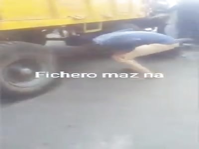 man crushed by truck and still alive