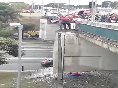 SUICIDE: Man Jumps off Overpass in Brazil.
