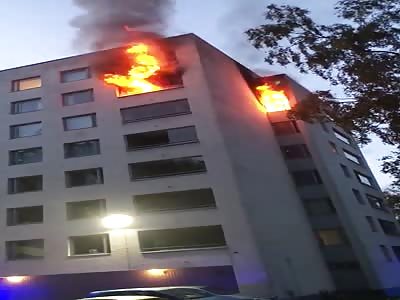 Man Jumps Out of Burning Building