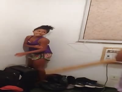 Angry Mother Beats her Daughter with Stick