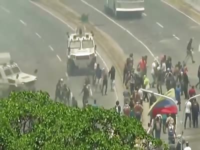 VENEZUELA: Military Vehicles Drive into Protesters Amid 'Attempted Coup'