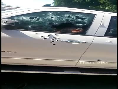 A Bullet Riddled Car has Two Dead Drug Dealer Inside.