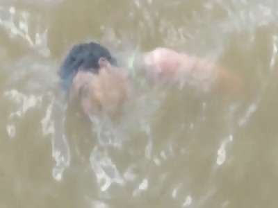 BODY OF MAN FLOATING IN THE RIVER