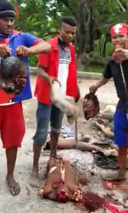 FULL VIDEO: Human Meat Market Chop Up on Road in Haiti