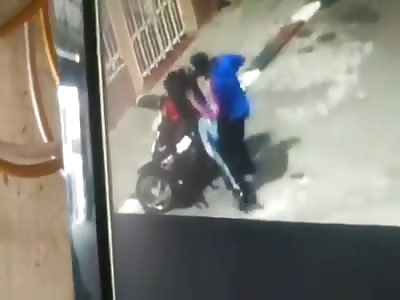 WOMAN KICKED IN THEFT