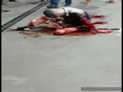 Young man bleeds and dies slowly in the street.