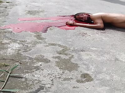 Murdered man, with a huge pool of blood