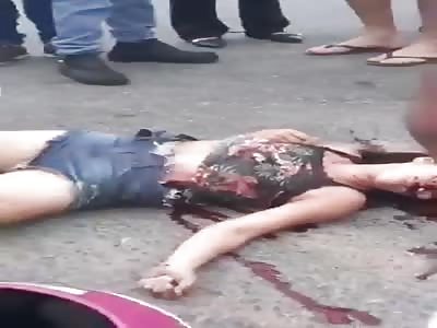 Woman dying on the road