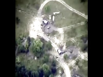 Drone Records Ukrainian Artillery Unit Taking Direct Hits 