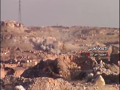 Deir Ez-Zour- Syrian army clashes with IS jihadists in the cemetery area