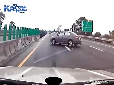 Car Smashes Into Concrete Barrier Ejecting Occupants