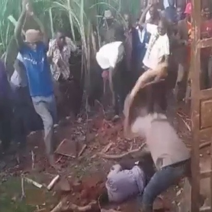 A Crowd Of Villagers Beat A Guilty Man To Death With Stones And Sticks