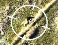 A drone drops 2 grenades on a walking ORCs