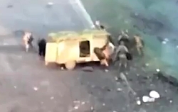 The Ukrainian mortar team is trying to destroy the vehicle and soldier