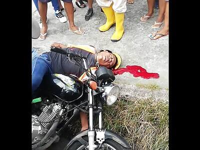 2 people on a motorcycle, who shot and ended the life of a female and 
