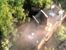 RU drones attacks immobilized UA armored car and it's wounded crew