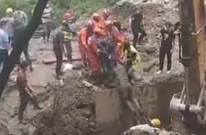 Digging out worker buried alive after landslide 