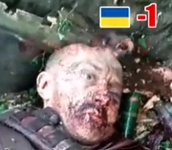 ORC inspect dead Ukrainian Soldier
