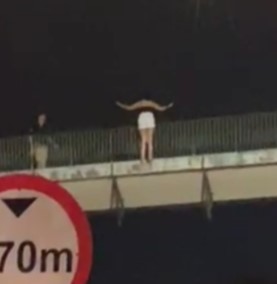 Desperate Woman Jumps From an Overpass