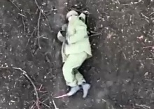 Ukrainian Grenade Rolls on a Russian Soldiers Lap and it Explodes