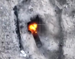 UA soldier is on fire after a grenade was dropped into their trench