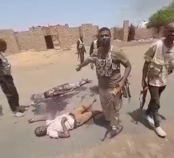 Sudanian army showing killed militia 