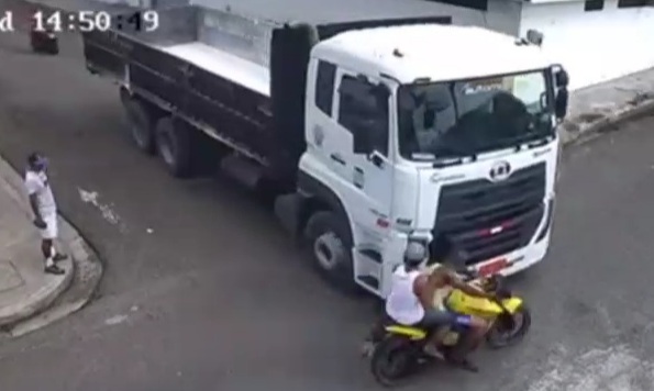 Motorcyclist crashes into truck one dies the other seriously injured 
