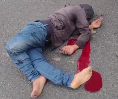 Twisted dead body of motorcyclist killing on the roads 