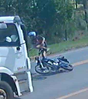 damn biker comes face to face with a rearing truck