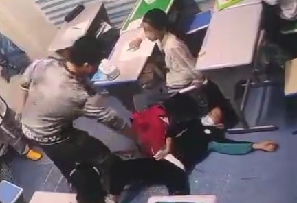 Abusive Teacher Savagely Beating Young Student 