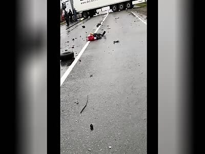 A truck collides with a driver causing him to lose his head