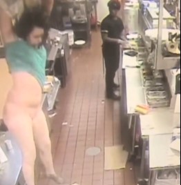 Half Naked Girl Falls From Ceiling of Fast Food Restaurant.