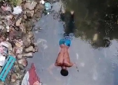 The body of a man was found floating in stream 