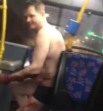 naked bloody man ride the bus and went into shops.